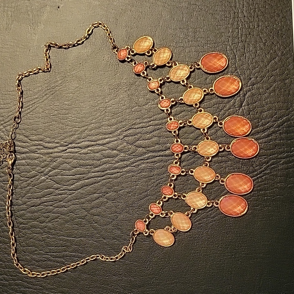 Vintage and vibrant bib necklace in peach, and amber tones